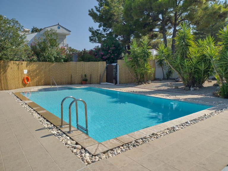 Villa Odysseus Rhodes Infinity swimming pool in daylight